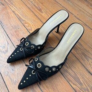 Black Pointed-Toe Mule Heels with Grommet & Bow